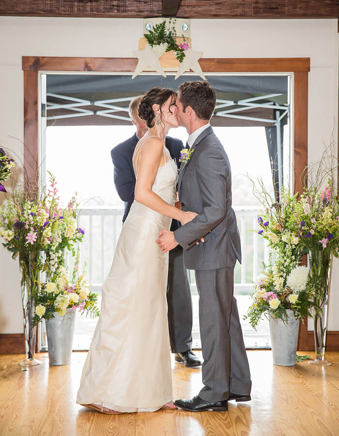 Bride and groom kissing